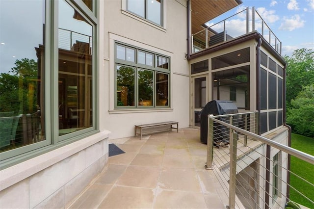 2720 Verona Cir, Mission Hills, KS 66208 - patio / terrace featuring a grill, a sunroom, and a patio