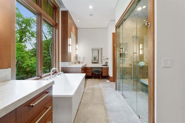 2720 Verona Cir, Mission Hills, KS 66208 - full bath with vanity, a stall shower, a soaking tub, and recessed lighting