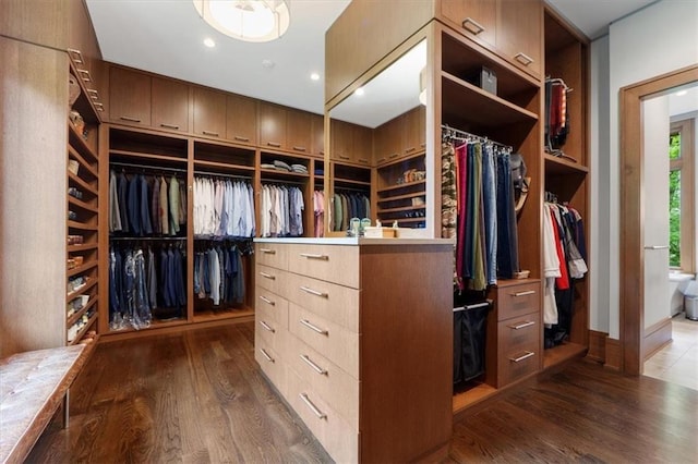 2720 Verona Cir, Mission Hills, KS 66208 - walk in closet with dark wood finished floors