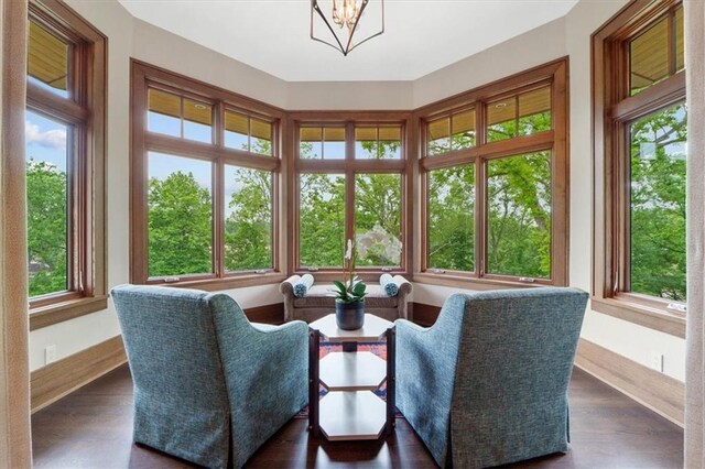 2720 Verona Cir, Mission Hills, KS 66208 - sunroom / solarium featuring a chandelier and baseboards
