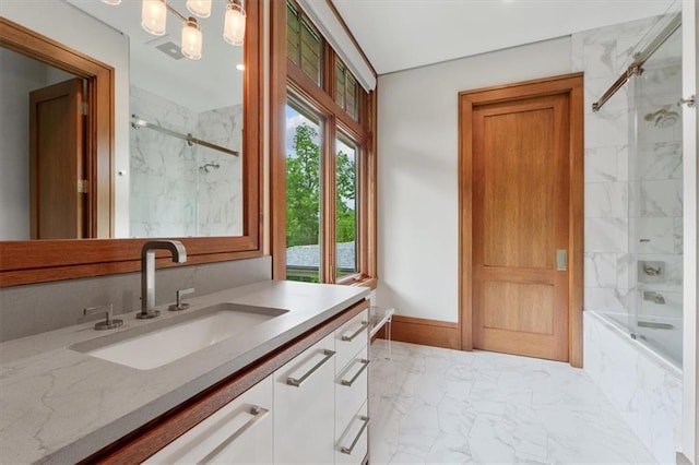 2720 Verona Cir, Mission Hills, KS 66208 - bathroom featuring marble finish floors, vanity, and combined bath / shower with glass door