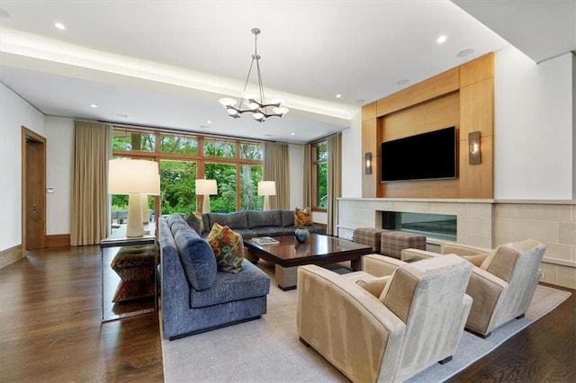 2720 Verona Cir, Mission Hills, KS 66208 - living area with wood finished floors, a chandelier, and recessed lighting