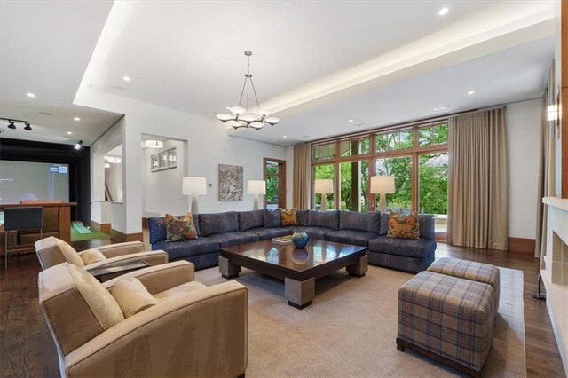 2720 Verona Cir, Mission Hills, KS 66208 - living area featuring a chandelier, recessed lighting, and wood finished floors