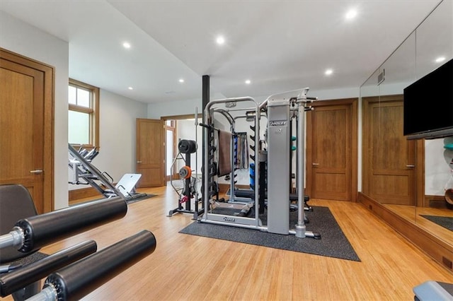 2720 Verona Cir, Mission Hills, KS 66208 - exercise room with light wood-type flooring and recessed lighting