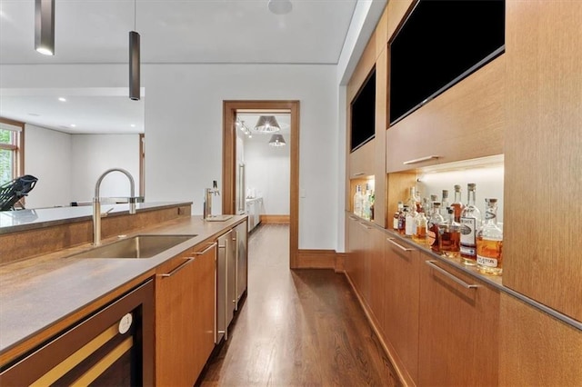 2720 Verona Cir, Mission Hills, KS 66208 - kitchen with dark wood-type flooring, brown cabinetry, modern cabinets, and dishwasher