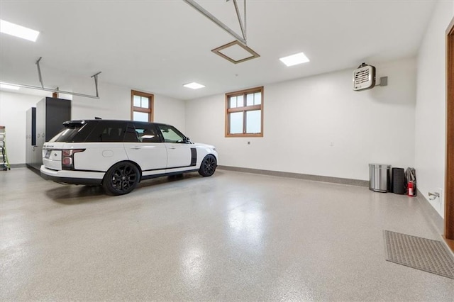 2720 Verona Cir, Mission Hills, KS 66208 - garage featuring baseboards