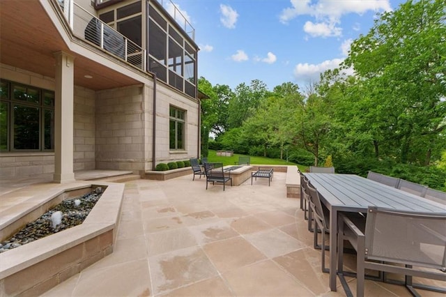 2720 Verona Cir, Mission Hills, KS 66208 - patio / terrace featuring a patio area, outdoor dining area, and a fire pit