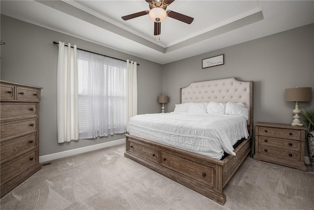 14168 Nicollete Ct, Basehor, KS 66007 - bedroom with light colored carpet, a raised ceiling, crown molding, and a ceiling fan