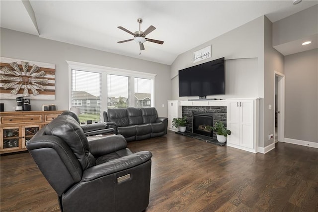 14168 Nicollete Ct, Basehor, KS 66007 - living area with ceiling fan, lofted ceiling, dark wood-style flooring, and a fireplace