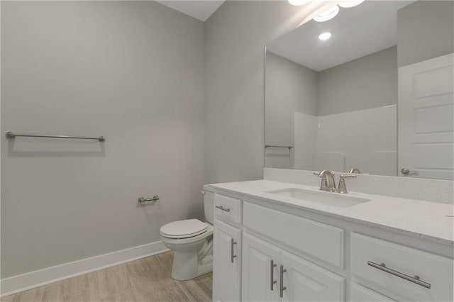 3720 NE 90th St, Kansas City, MO 64156 - bathroom featuring vanity, wood finished floors, and a shower