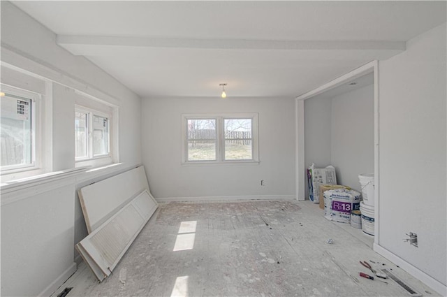 924 N Park Ave, Independence, MO 64050 - empty room with beamed ceiling