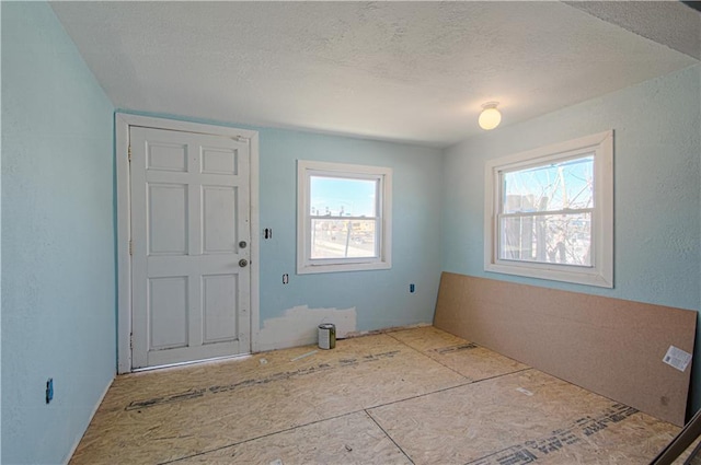 924 N Park Ave, Independence, MO 64050 - foyer entrance featuring a textured ceiling