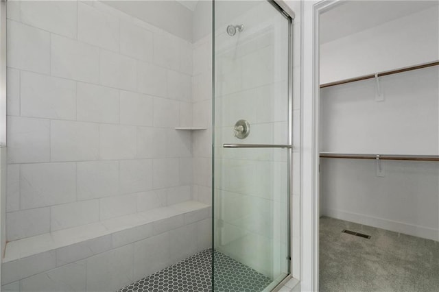 3707 NE 90th St, Kansas City, MO 64156 - bathroom featuring a stall shower and a walk in closet