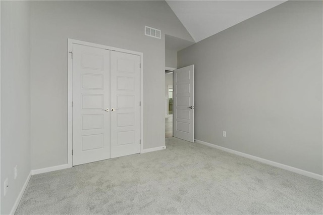 3707 NE 90th St, Kansas City, MO 64156 - unfurnished bedroom featuring carpet floors, a closet, and lofted ceiling