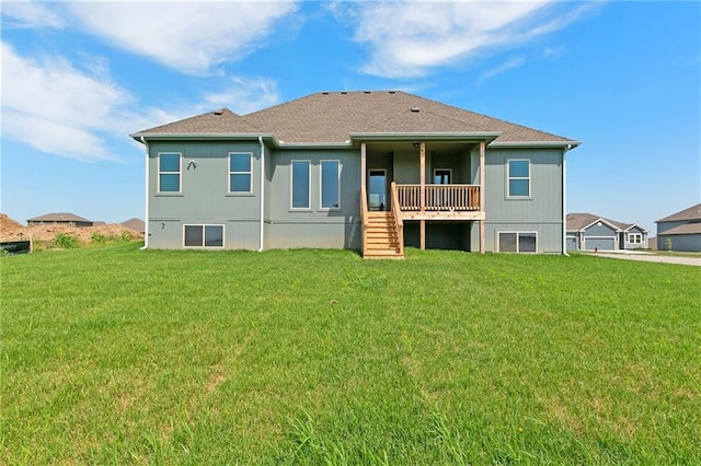 3707 NE 90th St, Kansas City, MO 64156 - back of property featuring stairway, a lawn, and a shingled roof