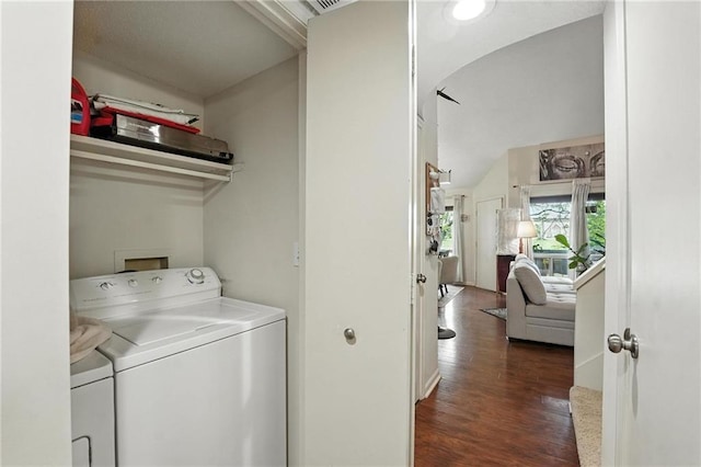 11134 Nieman Rd Unit 201, Overland Park, KS 66210 - washroom featuring washer and clothes dryer, arched walkways, and wood finished floors