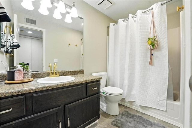 11134 Nieman Rd Unit 201, Overland Park, KS 66210 - full bathroom featuring vanity, tile patterned floors, and shower / bath combo with shower curtain