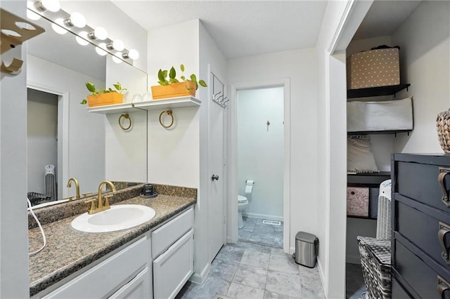 11134 Nieman Rd Unit 201, Overland Park, KS 66210 - full bath featuring vanity and toilet