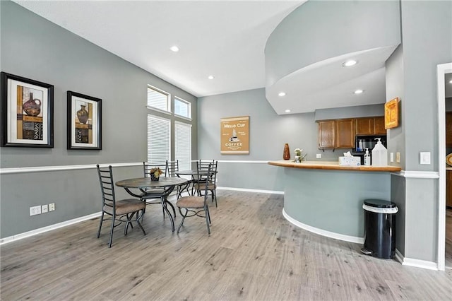 11134 Nieman Rd Unit 201, Overland Park, KS 66210 - dining space with light wood finished floors and recessed lighting