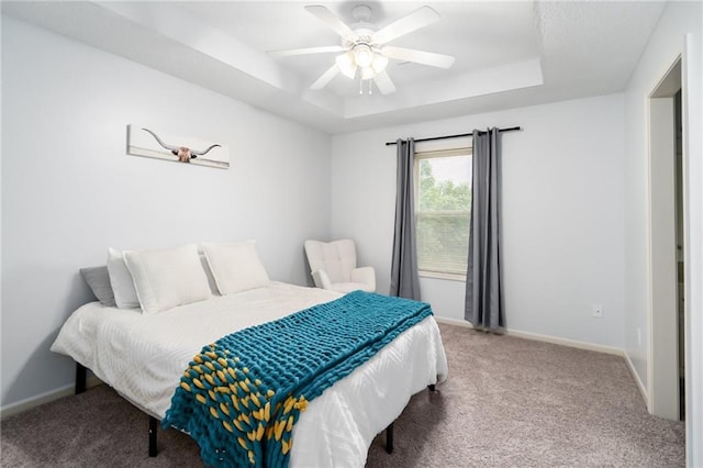 22833 W 44th St, Shawnee, KS 66226 - carpeted bedroom featuring a raised ceiling and ceiling fan