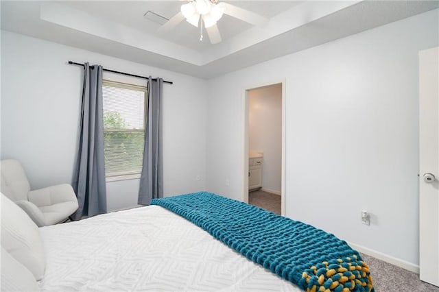 22833 W 44th St, Shawnee, KS 66226 - bedroom with a tray ceiling, carpet, and ceiling fan