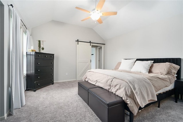 22833 W 44th St, Shawnee, KS 66226 - carpeted bedroom featuring a barn door, lofted ceiling, and a ceiling fan