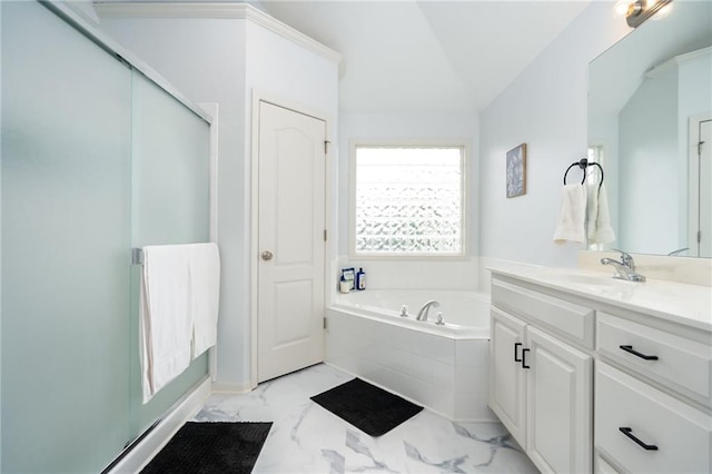 22833 W 44th St, Shawnee, KS 66226 - bathroom with marble look tile flooring, a garden tub, vanity, and vaulted ceiling