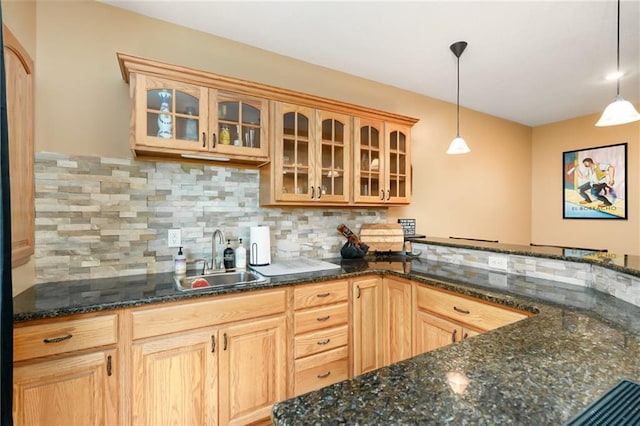 22833 W 44th St, Shawnee, KS 66226 - kitchen featuring decorative backsplash, pendant lighting, and glass insert cabinets