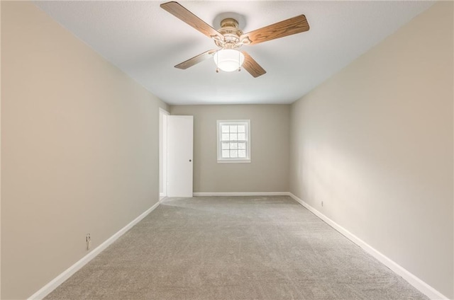 7306 N Holmes Ave, Gladstone, MO 64118 - unfurnished room with carpet flooring and a ceiling fan