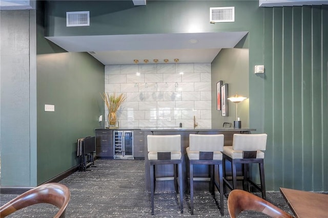 4545 Wornall Rd Unit 1009, Kansas City, MO 64111 - indoor wet bar with beverage cooler