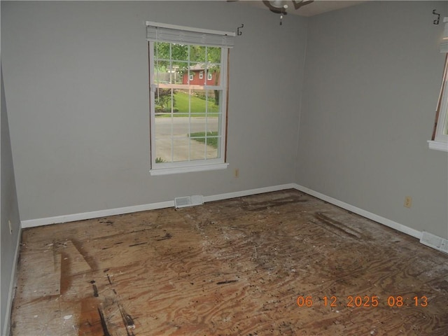 326 Virginia Rd, Excelsior Springs, MO 64024 - empty room with baseboards and ceiling fan