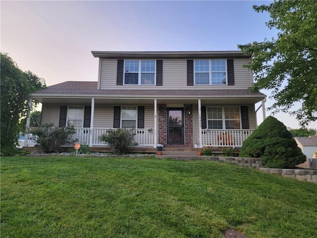 19400 E 13th St N, Independence, MO 64056 - view of front facade featuring a front lawn and a porch
