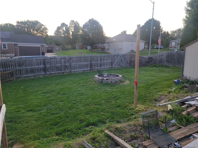 19400 E 13th St N, Independence, MO 64056 - fenced backyard featuring a residential view and an outdoor fire pit