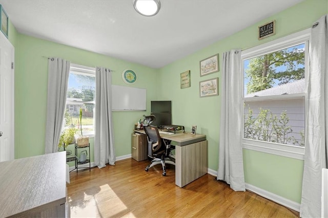 13500 Spring St, Grandview, MO 64030 - home office featuring light wood-type flooring
