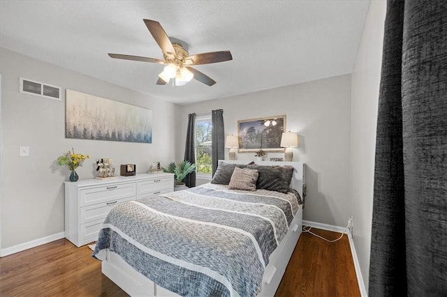 13500 Spring St, Grandview, MO 64030 - bedroom featuring wood finished floors and a ceiling fan