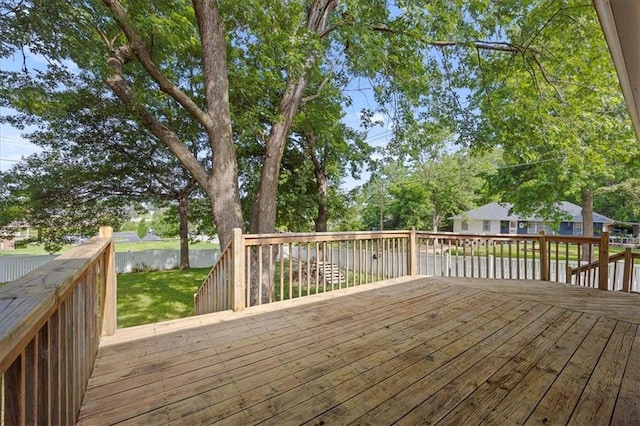 13500 Spring St, Grandview, MO 64030 - wooden terrace with a yard and a water view
