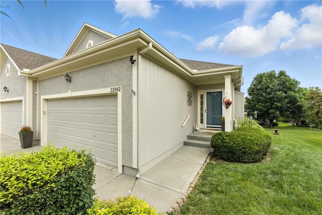22802 W 72nd Ter, Shawnee, KS 66227 - view of side of property featuring an attached garage and a lawn