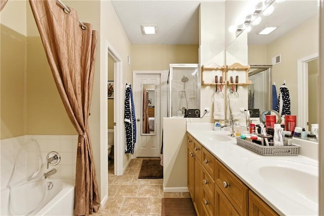 22802 W 72nd Ter, Shawnee, KS 66227 - full bathroom with a garden tub, double vanity, a stall shower, and tile patterned floors