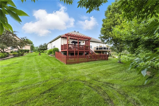 22802 W 72nd Ter, Shawnee, KS 66227 - rear view of house with a pergola, a wooden deck, and a yard