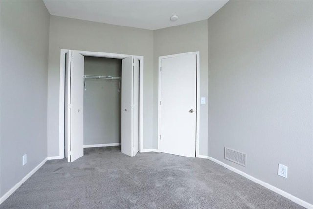 653 S Woodson Ln, Gardner, KS 66030 - unfurnished bedroom featuring carpet and a closet