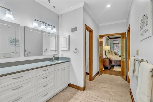22810 SW Hampton Ct, Blue Springs, MO 64015 - ensuite bathroom with crown molding and vanity