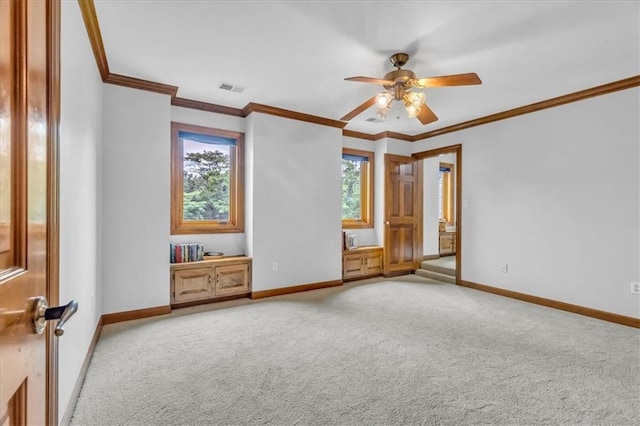 22810 SW Hampton Ct, Blue Springs, MO 64015 - spare room featuring light carpet, ceiling fan, and crown molding