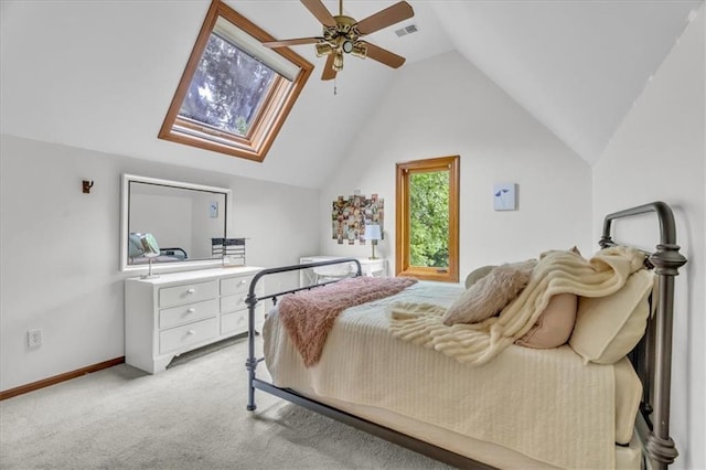 22810 SW Hampton Ct, Blue Springs, MO 64015 - bedroom featuring vaulted ceiling, light carpet, a skylight, and a ceiling fan