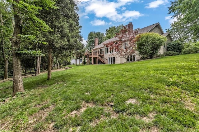 22810 SW Hampton Ct, Blue Springs, MO 64015 - view of grassy yard with stairway and a deck