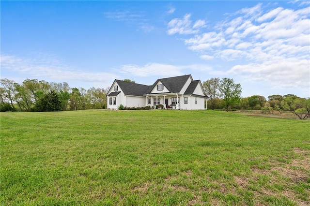 1077 N 150th Rd, Baldwin City, KS 66006 - view of front of home with a front lawn and a porch