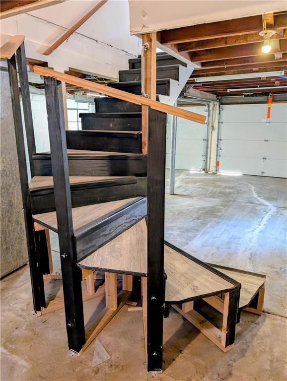 830 Locust St, Eudora, KS 66025 - below grade area with stairway