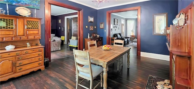 615 N Jefferson St, Carrollton, MO 64633 - dining area with ornamental molding and dark wood finished floors
