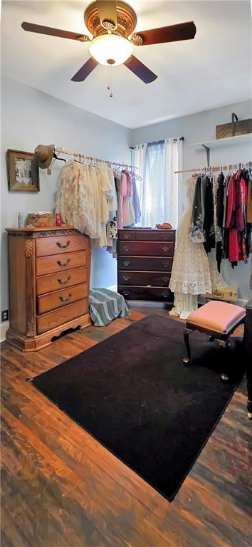 615 N Jefferson St, Carrollton, MO 64633 - bedroom featuring wood finished floors and ceiling fan