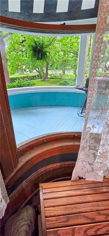 615 N Jefferson St, Carrollton, MO 64633 - view of pool with covered porch