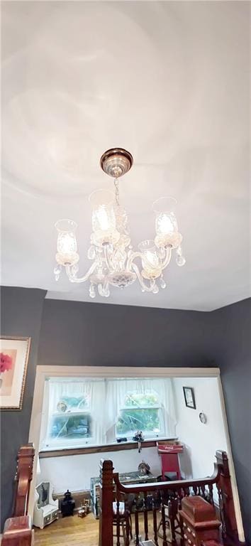 615 N Jefferson St, Carrollton, MO 64633 - detailed view of a chandelier and wood finished floors